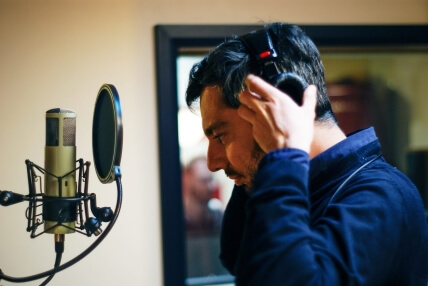 Man recording vocals